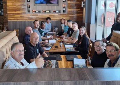 People in restaurant after the last training session of the Vasbyt training week for black and brown belts.