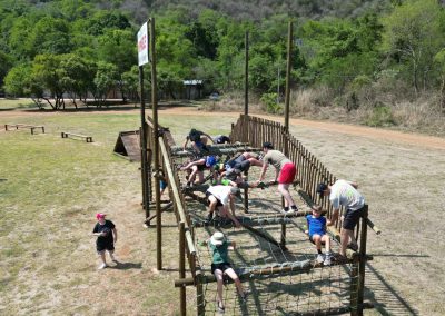 Group of Kids doing obstacle course Games at Mankele Aventures